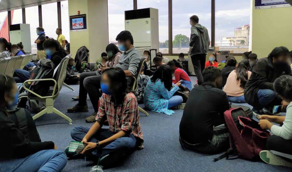 Indians waiting for the repatriation flight at NAIA airport Manila