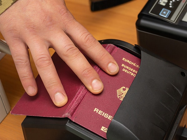 Scanning Machine Readable passport at immigration
